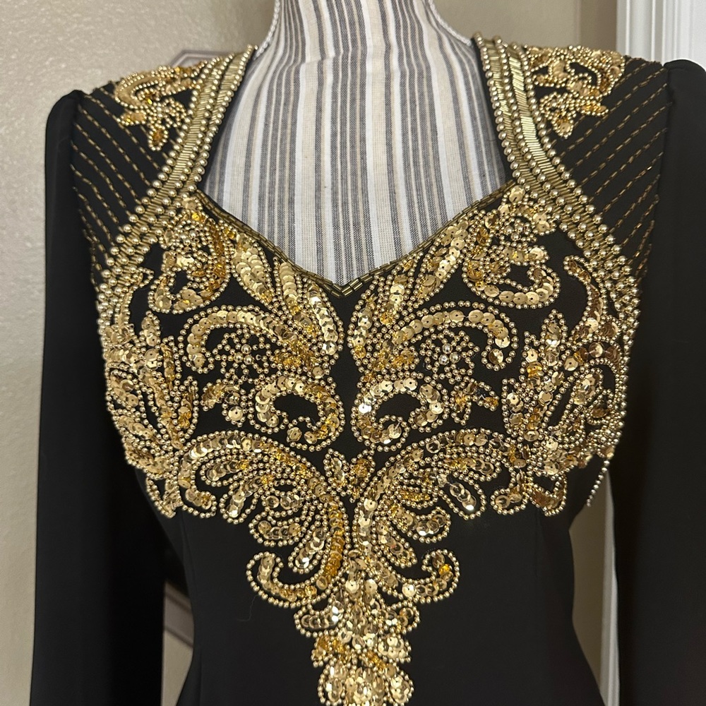 Showstopping Jovani back gown with gold sequins